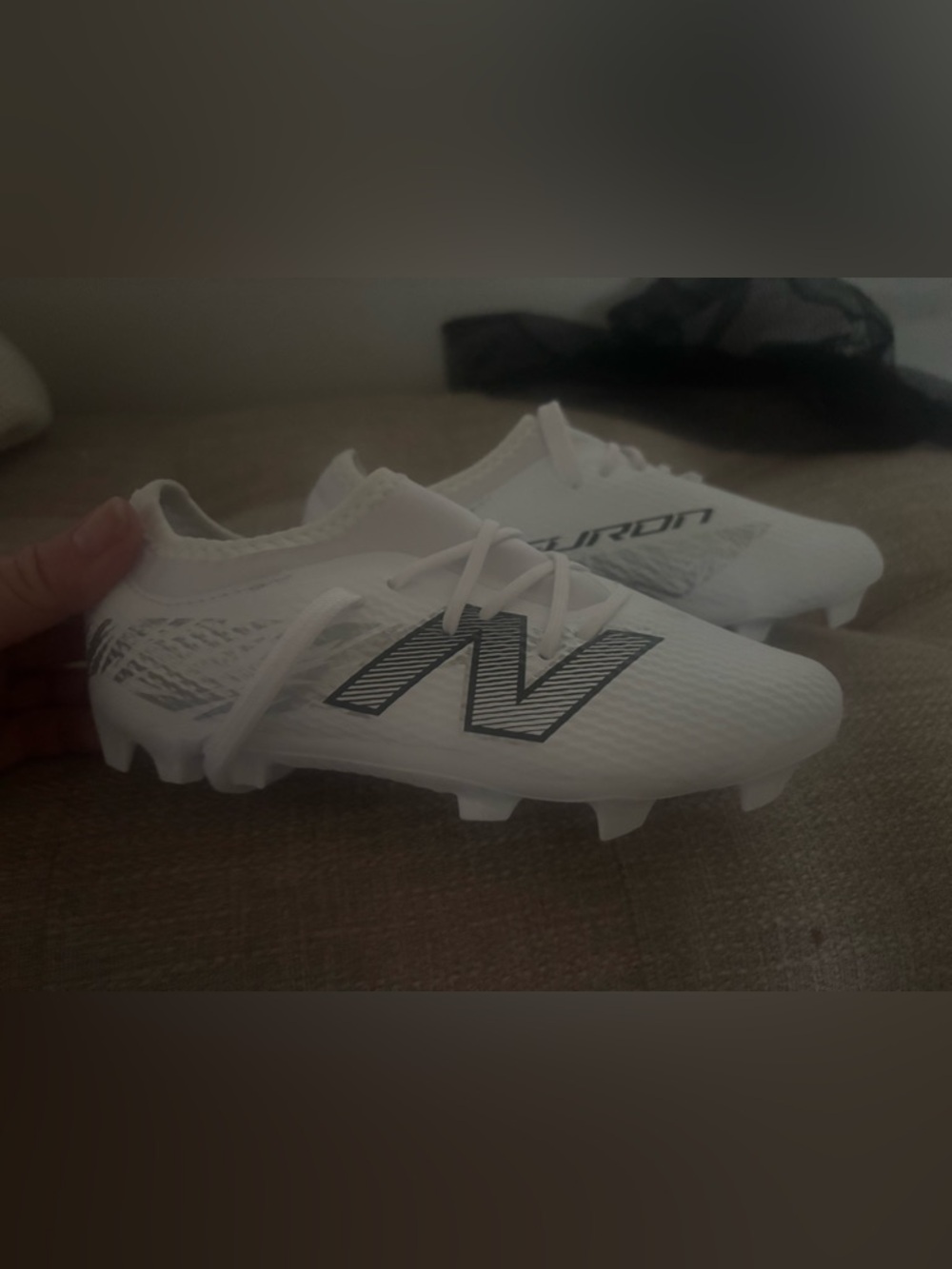 New Balance White Soccer Cleats with Black Logo